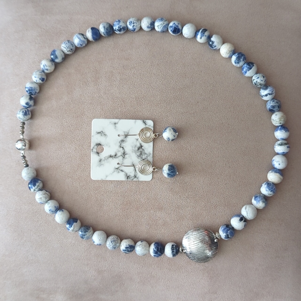 Rare white sodalite stone set